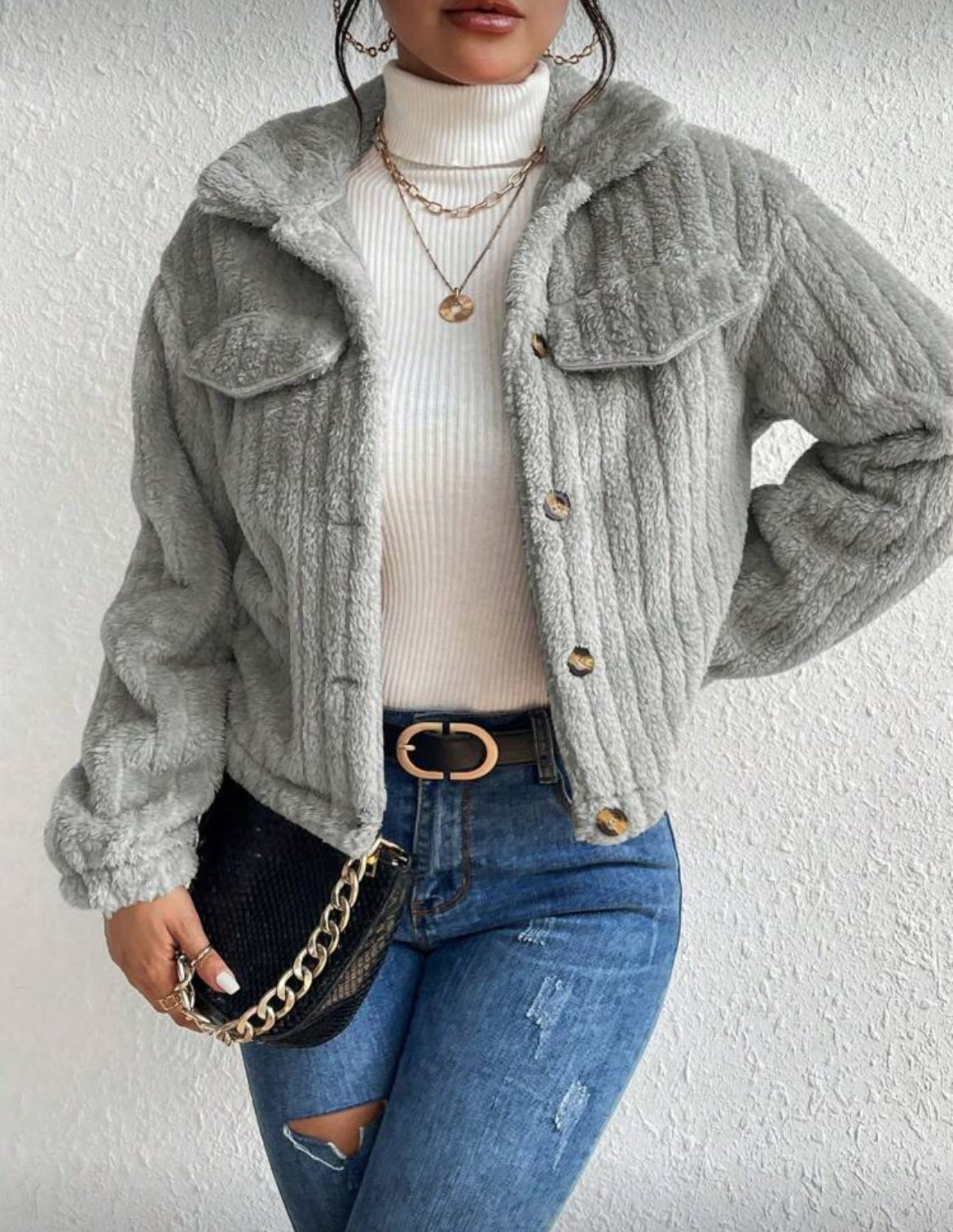 Veste courte en matière effet teddy à boutons