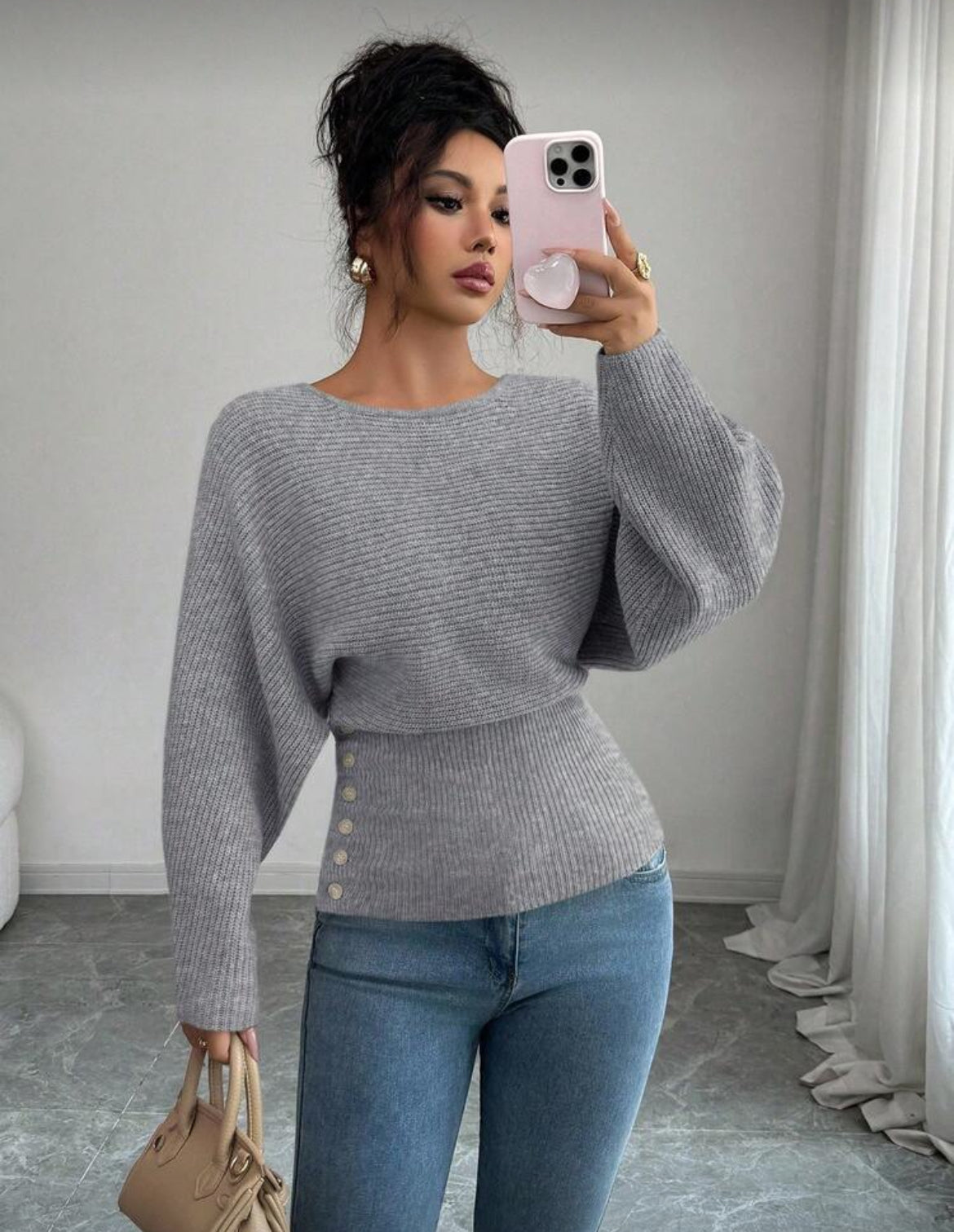 Pull ajusté à manches ballon avec taille structurée